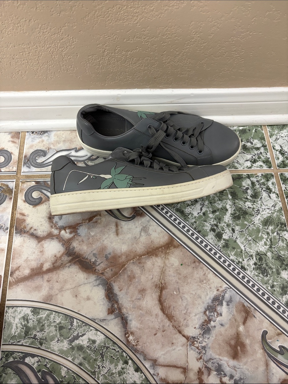 Prada Gray Low-Top Sneakers with Green Leaf Detail